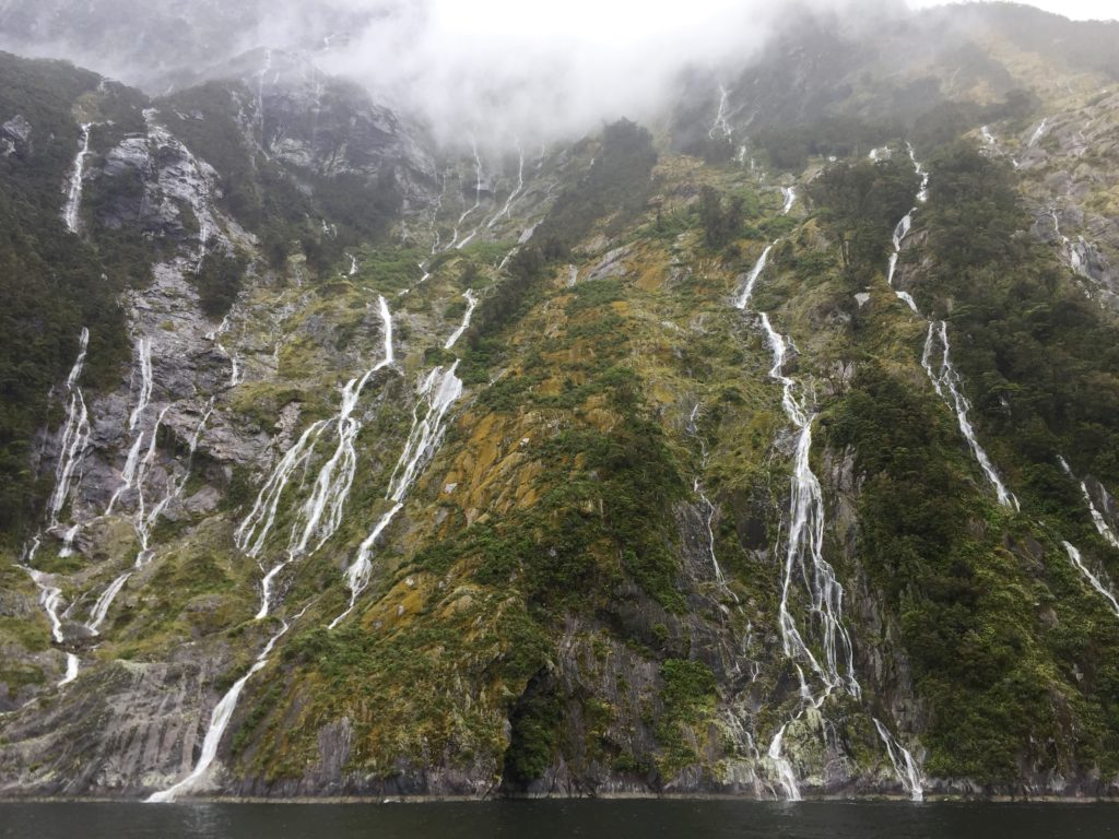 Cliff waterfalls, Milford Sound, Fiordland National Park, New Zealand