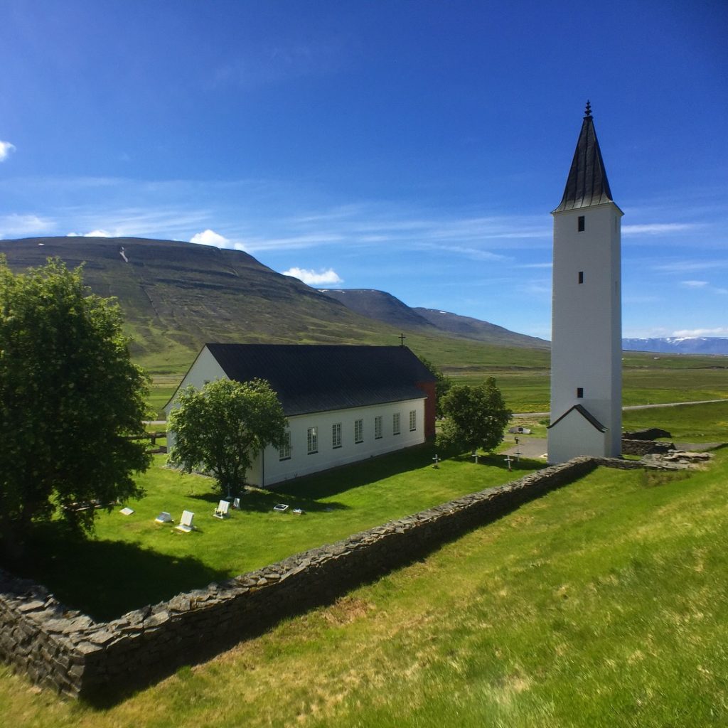 Blue sky, green grass, Holar Cathedral, Holar, Iceland