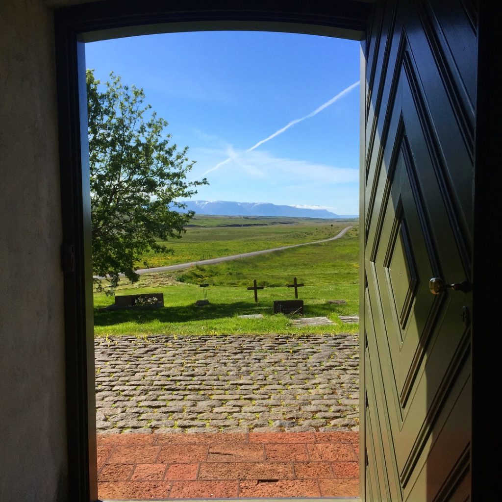Looking out the front door of Holar Cathedral, Holar, Iceland