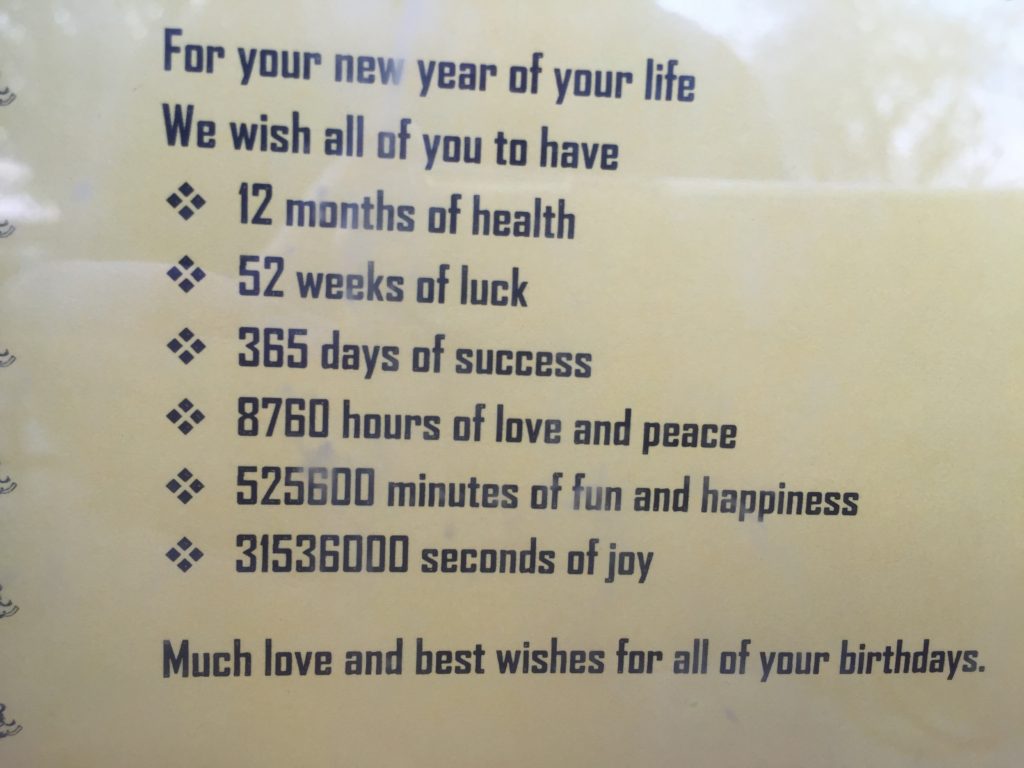 Printed saying on health, luck, success, love, peace, fun, happiness and joy at the Light of Love High School.