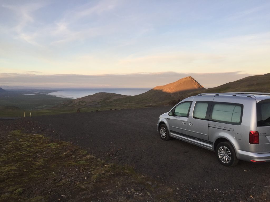 VW Caddy Camper parked overlooking a valley and water on the Snaefellsnes Peninsula