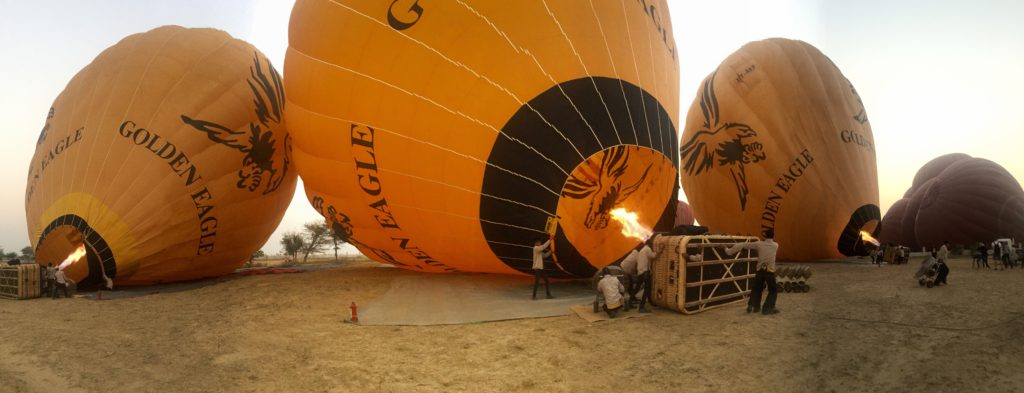 Panorama of hot air balloons being inflated, Bagan, Myanmar