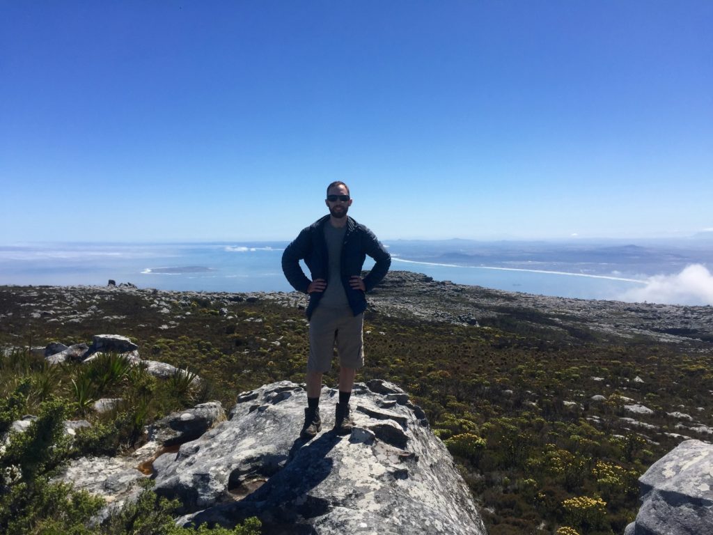 Wide views with me standing on a rock atop Table Mountain