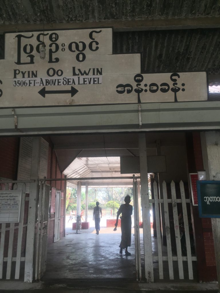 Pyin Oo Lwin train station with sign of 3,506 foot elevation