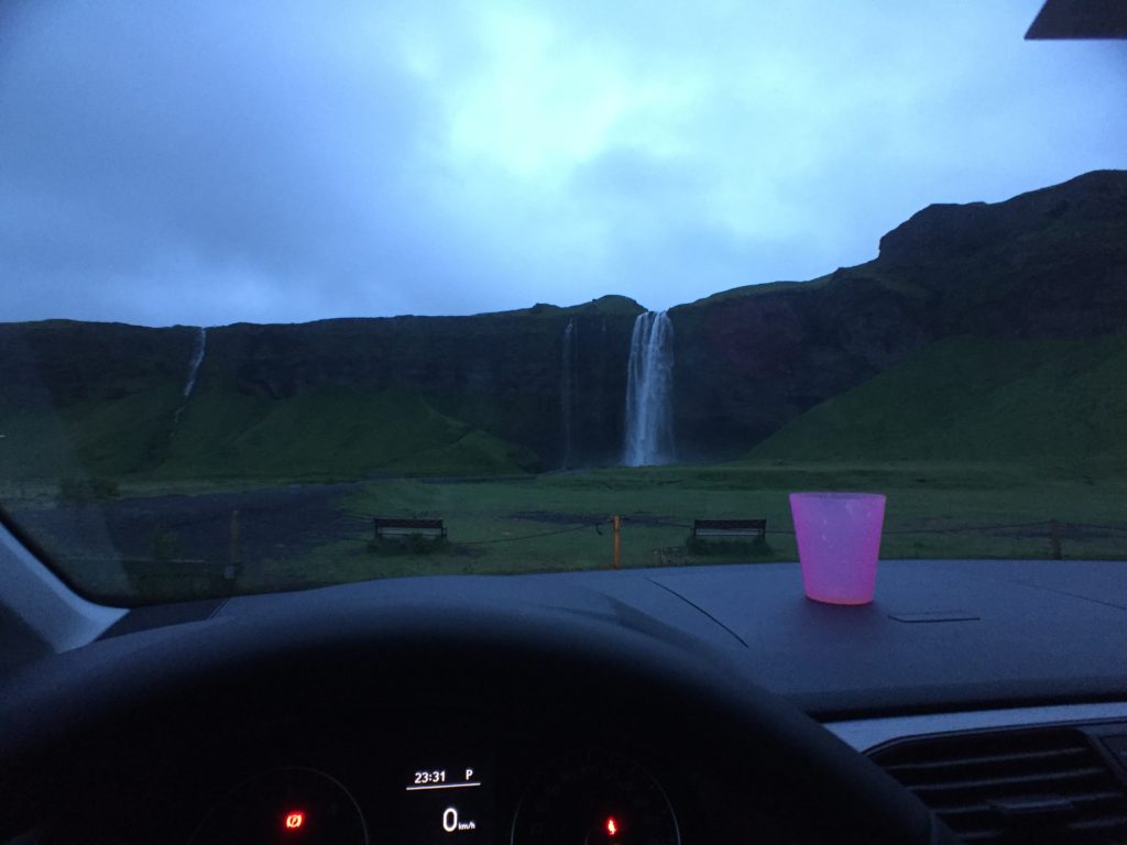 Seljalandsfoss waterfall viewed from the front seat of my car