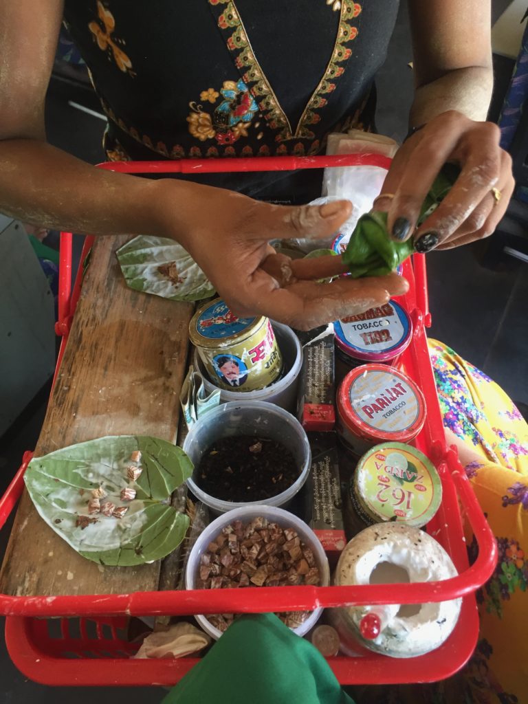 Overhead view of vendor hawking betel nut