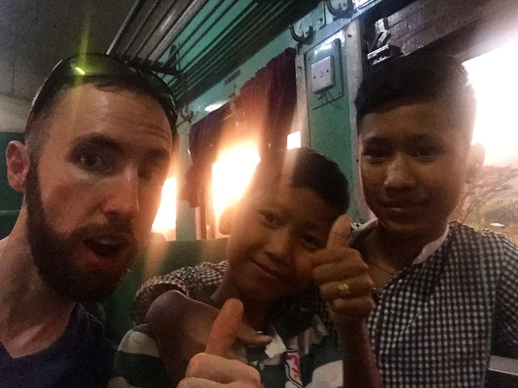 Me with two local kids giving thumbs up