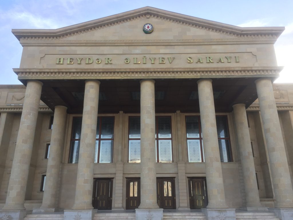Classical Greek building with name of Heydar Aliyev inscribed atop